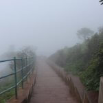 places to visit around chikmagalur - Stairs leading to Manikyadhara Falls