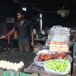 places to visit around chikmagalur - Vendor making bread omlette near Manikyadhara Falls